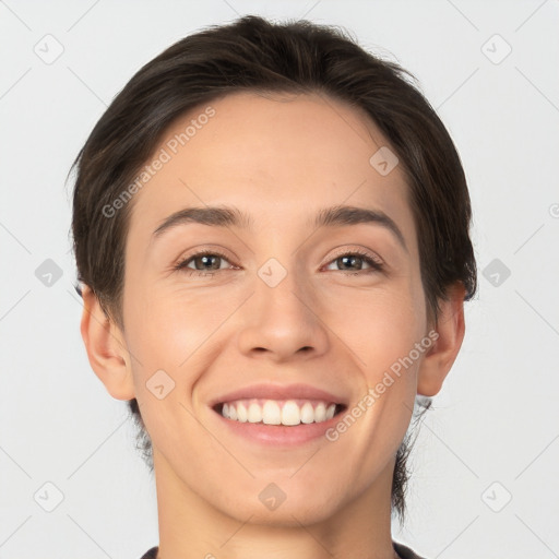 Joyful white young-adult female with short  brown hair and brown eyes