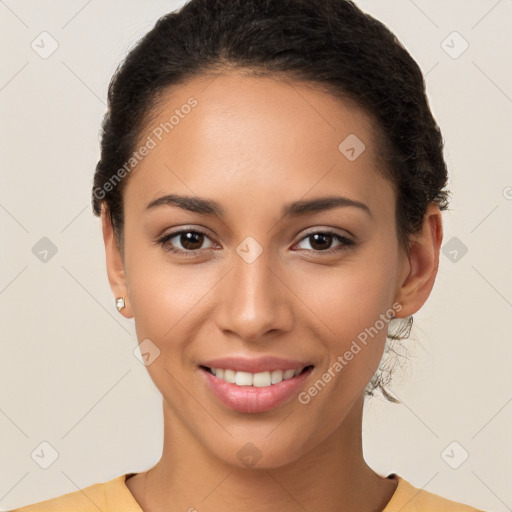 Joyful white young-adult female with short  brown hair and brown eyes