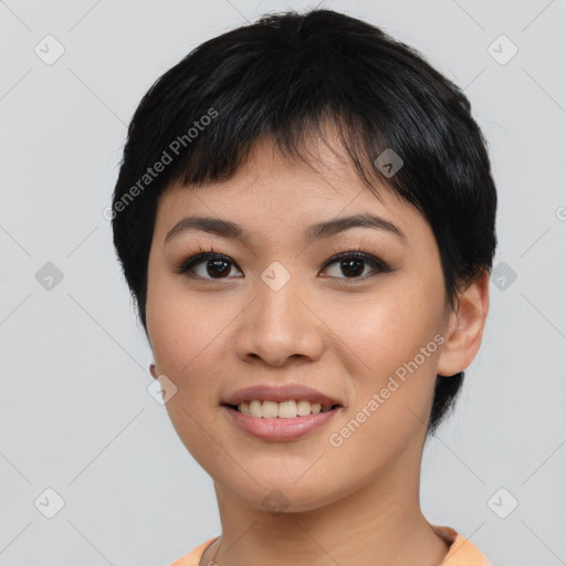 Joyful asian young-adult female with short  black hair and brown eyes