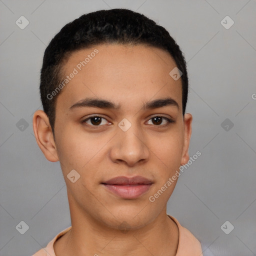 Joyful latino young-adult male with short  brown hair and brown eyes