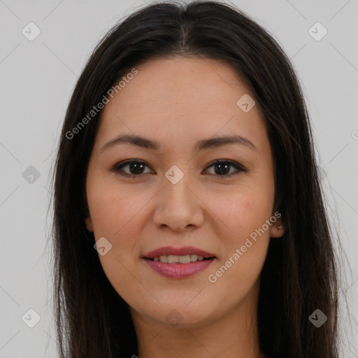 Joyful latino young-adult female with long  brown hair and brown eyes