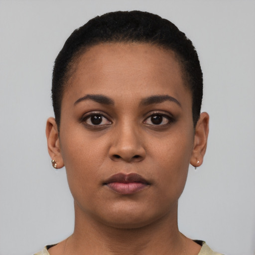 Neutral latino young-adult female with short  black hair and brown eyes