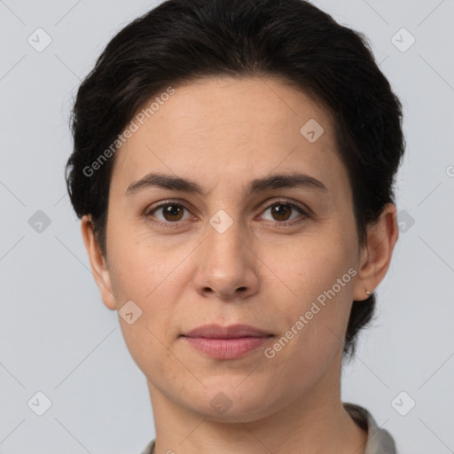 Joyful white young-adult female with short  brown hair and brown eyes