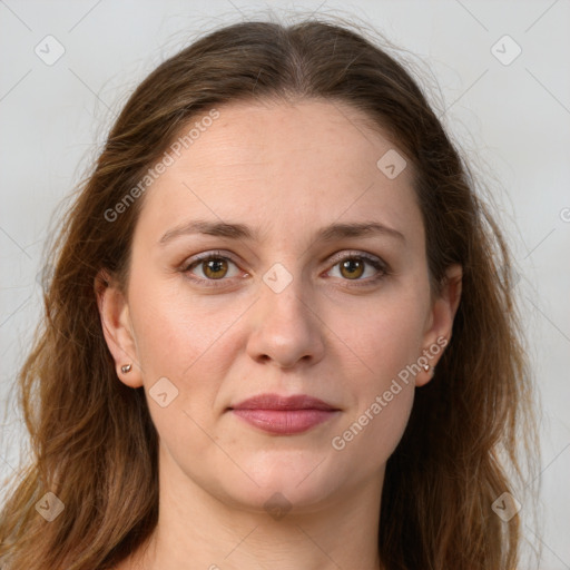 Joyful white young-adult female with long  brown hair and green eyes