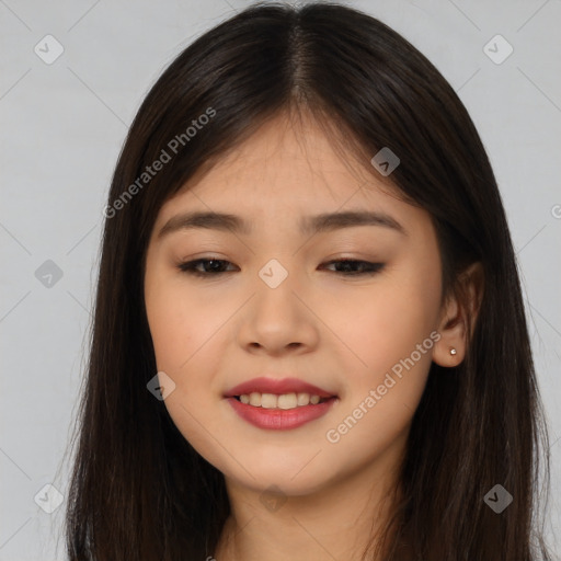 Joyful asian young-adult female with long  brown hair and brown eyes