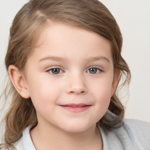 Joyful white child female with medium  brown hair and blue eyes