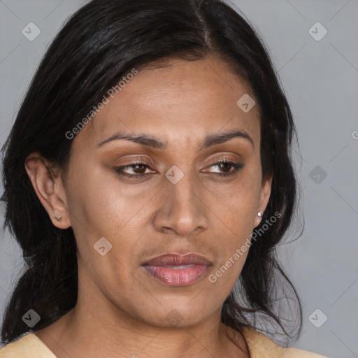 Joyful asian adult female with medium  brown hair and brown eyes