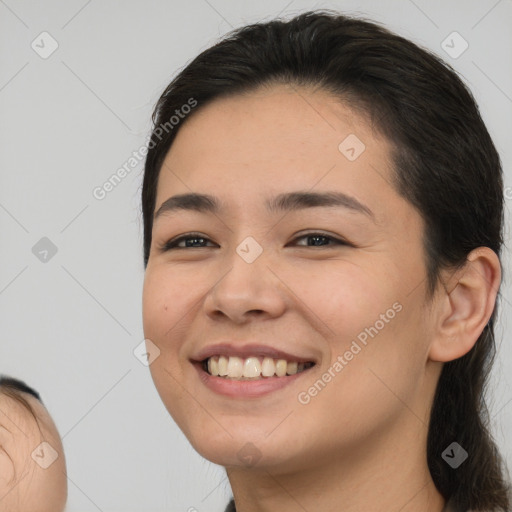 Joyful white young-adult female with medium  brown hair and brown eyes