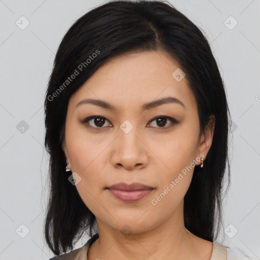 Joyful asian young-adult female with medium  black hair and brown eyes