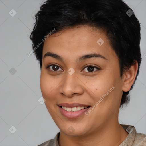 Joyful asian young-adult female with medium  brown hair and brown eyes