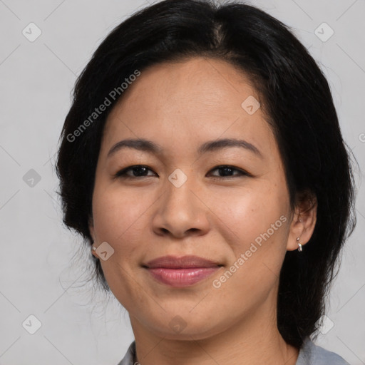 Joyful asian young-adult female with medium  black hair and brown eyes