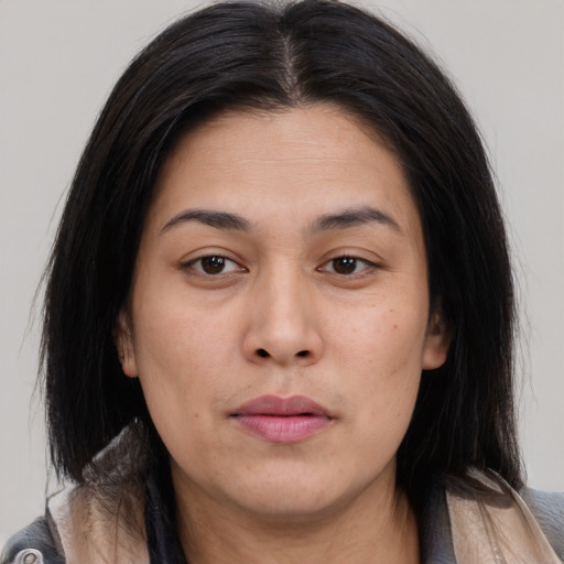 Neutral asian young-adult female with medium  brown hair and brown eyes