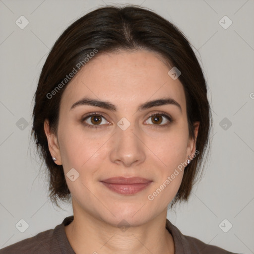 Joyful white young-adult female with medium  brown hair and brown eyes