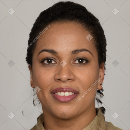 Joyful black young-adult female with short  brown hair and brown eyes