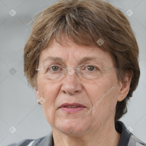 Joyful white middle-aged female with medium  brown hair and grey eyes