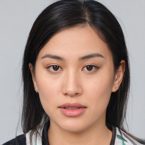 Neutral asian young-adult female with medium  brown hair and brown eyes