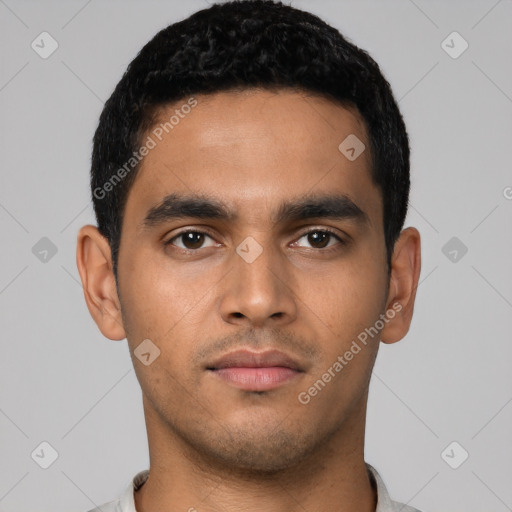 Neutral latino young-adult male with short  black hair and brown eyes