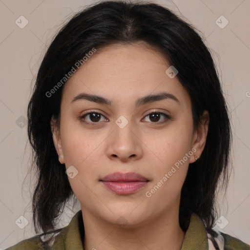 Joyful latino young-adult female with medium  brown hair and brown eyes