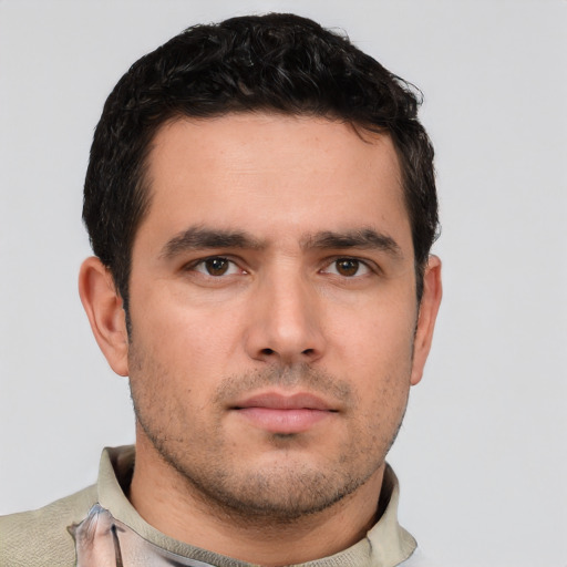 Neutral white young-adult male with short  black hair and brown eyes