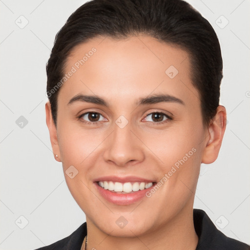 Joyful white young-adult female with short  brown hair and brown eyes