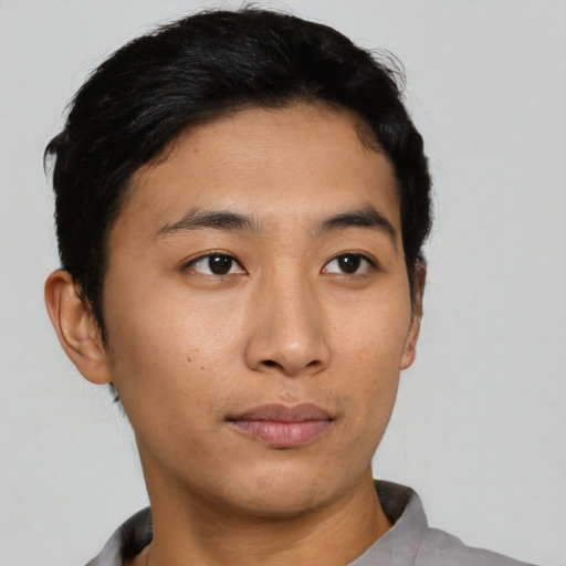 Neutral asian young-adult male with short  black hair and brown eyes