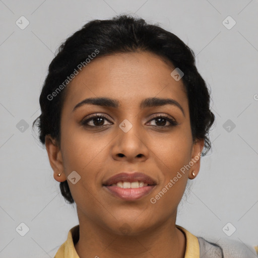 Joyful latino young-adult female with short  black hair and brown eyes