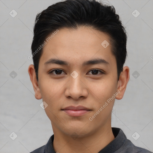 Joyful latino young-adult male with short  black hair and brown eyes