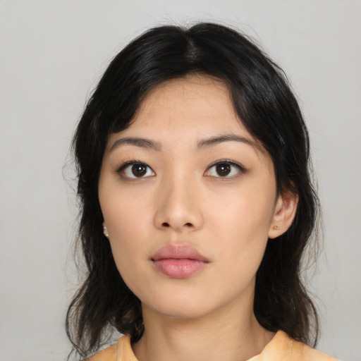 Neutral asian young-adult female with medium  black hair and brown eyes