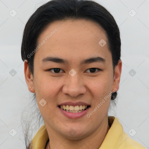 Joyful asian young-adult male with short  brown hair and brown eyes