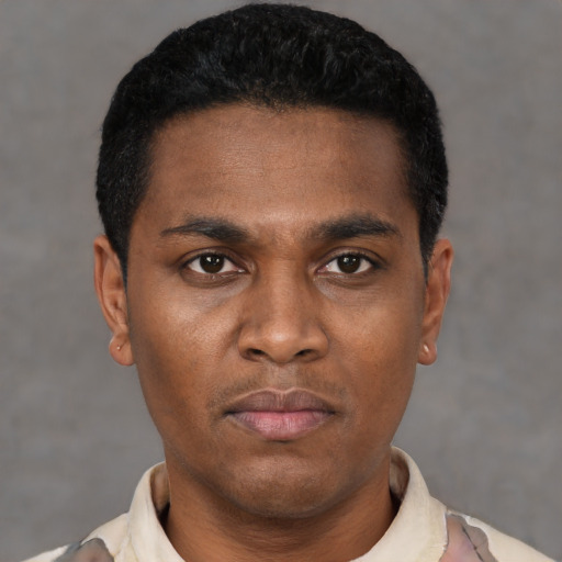 Neutral black young-adult male with short  black hair and brown eyes