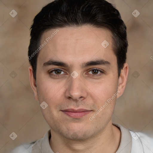 Joyful white young-adult male with short  black hair and brown eyes