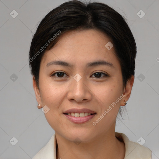 Joyful asian young-adult female with short  brown hair and brown eyes