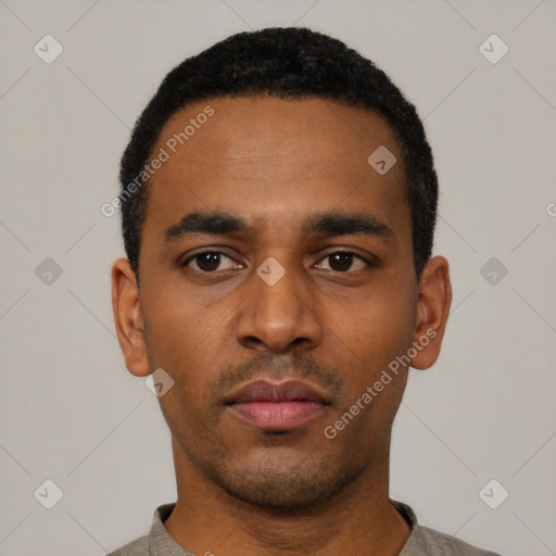 Neutral latino young-adult male with short  black hair and brown eyes