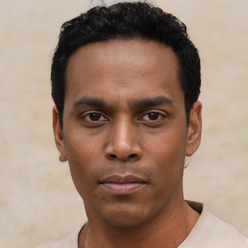 Neutral black young-adult male with short  black hair and brown eyes