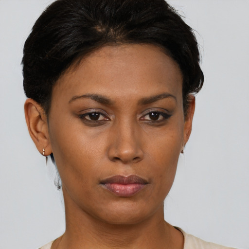 Neutral black young-adult female with short  brown hair and brown eyes