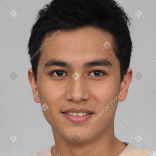 Joyful latino young-adult male with short  black hair and brown eyes