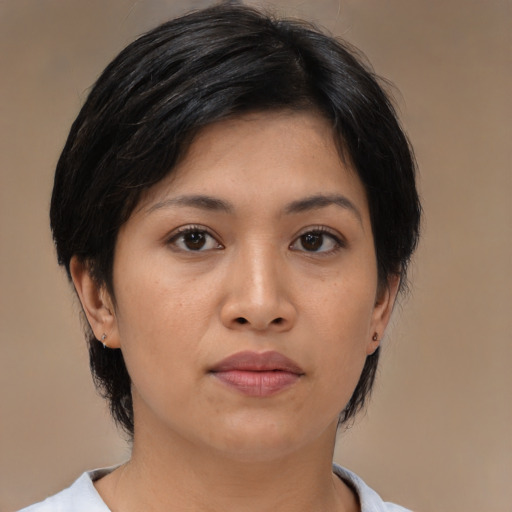 Neutral asian young-adult female with medium  black hair and brown eyes