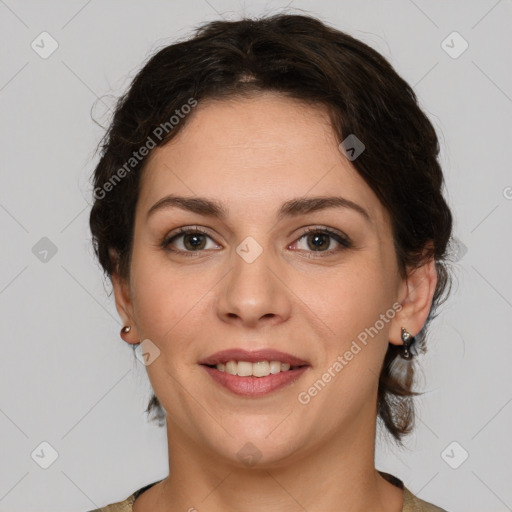 Joyful white young-adult female with medium  brown hair and green eyes