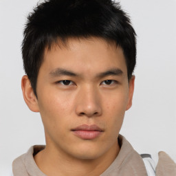 Neutral asian young-adult male with short  brown hair and brown eyes