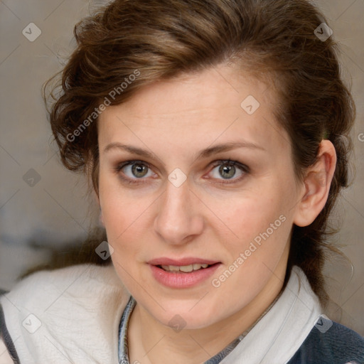 Joyful white young-adult female with medium  brown hair and blue eyes