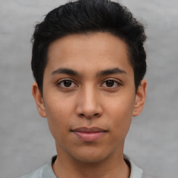 Neutral asian young-adult male with short  brown hair and brown eyes