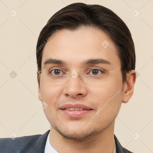 Joyful white young-adult male with short  brown hair and brown eyes