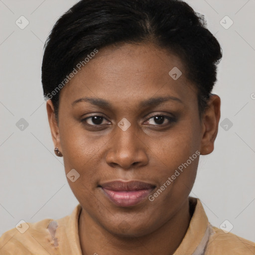 Joyful black young-adult female with short  brown hair and brown eyes