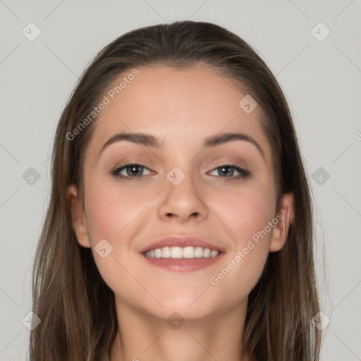 Joyful white young-adult female with long  brown hair and grey eyes