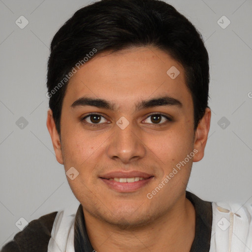 Joyful latino young-adult male with short  black hair and brown eyes