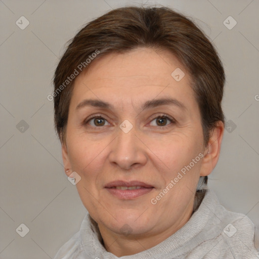 Joyful white adult female with short  brown hair and brown eyes