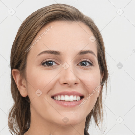 Joyful white young-adult female with long  brown hair and grey eyes