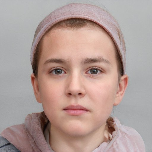 Neutral white child female with short  brown hair and blue eyes