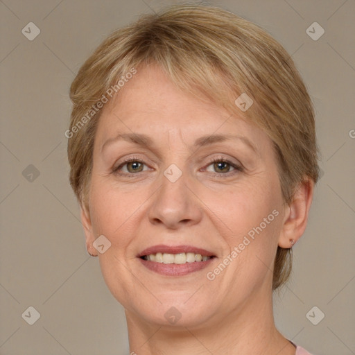 Joyful white adult female with medium  brown hair and grey eyes