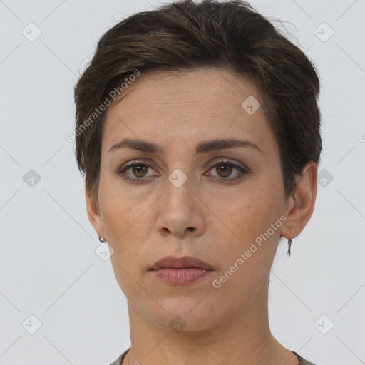 Neutral white young-adult female with short  brown hair and brown eyes